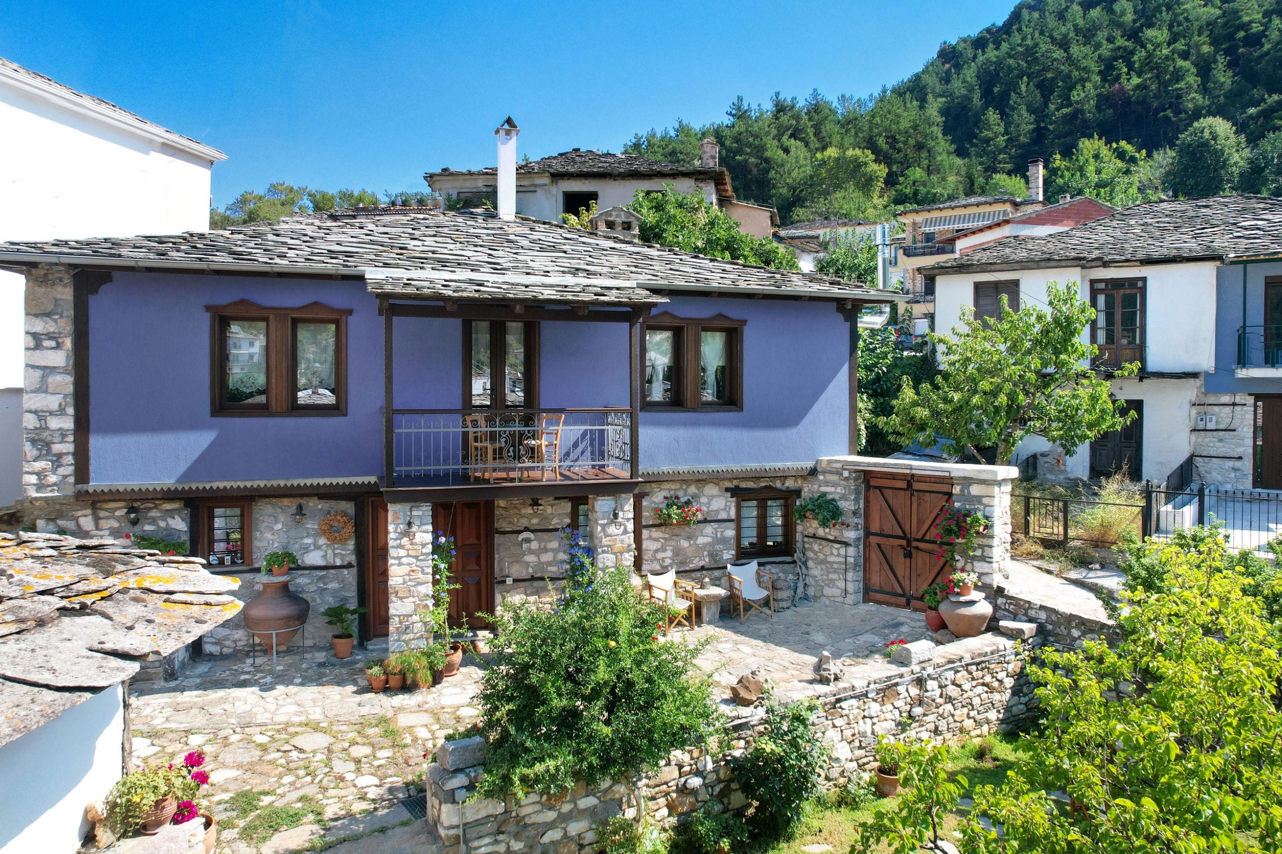 Exterior, courtyard, and village view 5 at Maroyda Stonehouse in Panagia, Thassos